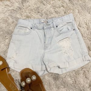 Distressed denim shorts
